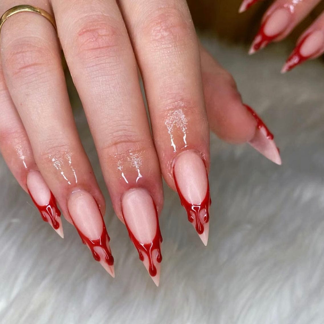 Blood drip nails featuring blood Halloween nails and bloody nails for a spooky and dramatic Halloween manicure.