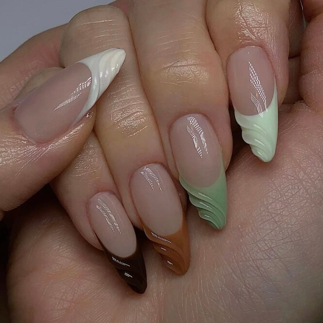 Coloured French manicure with vibrant hues for a modern twist on the classic look