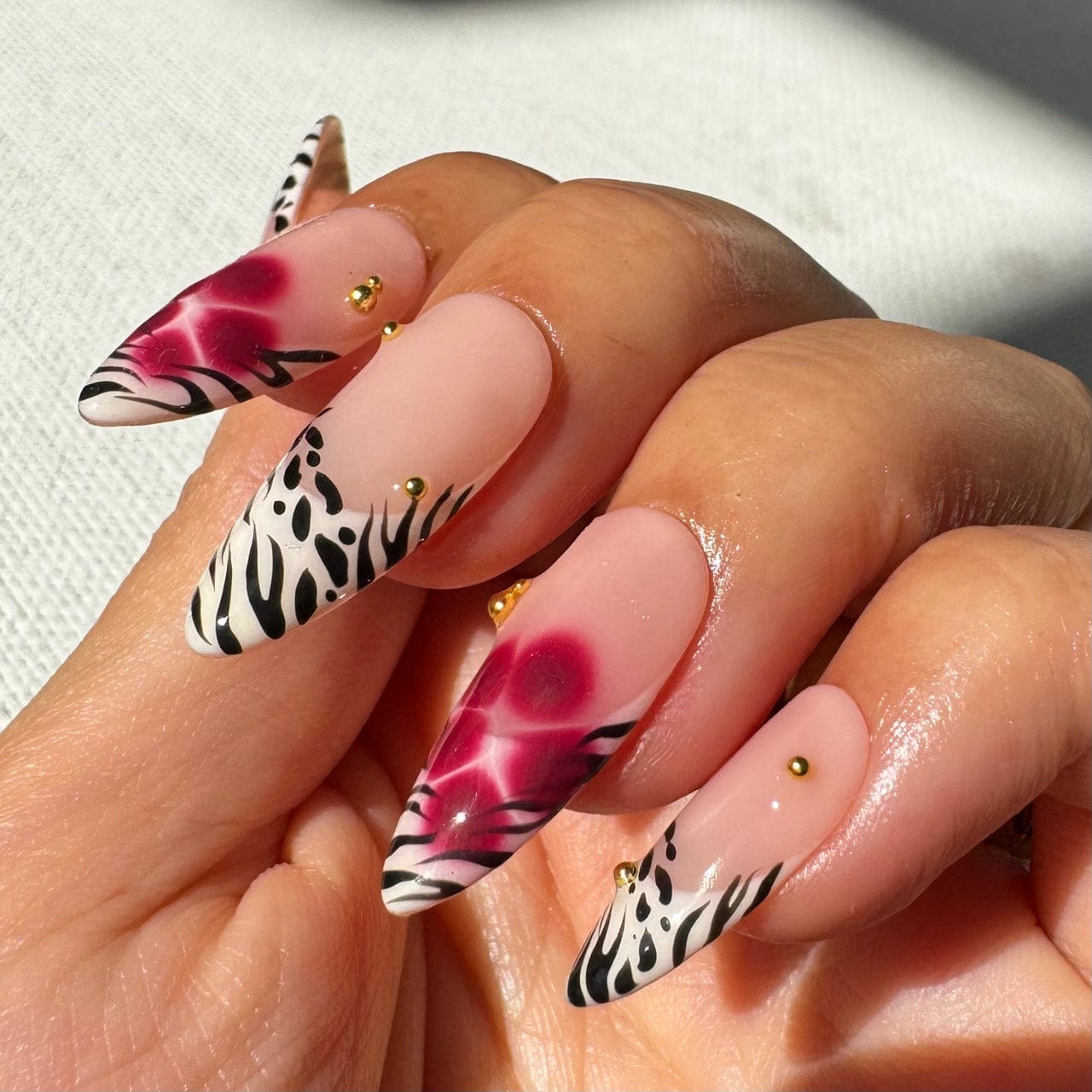 Short almond nails with stylish design