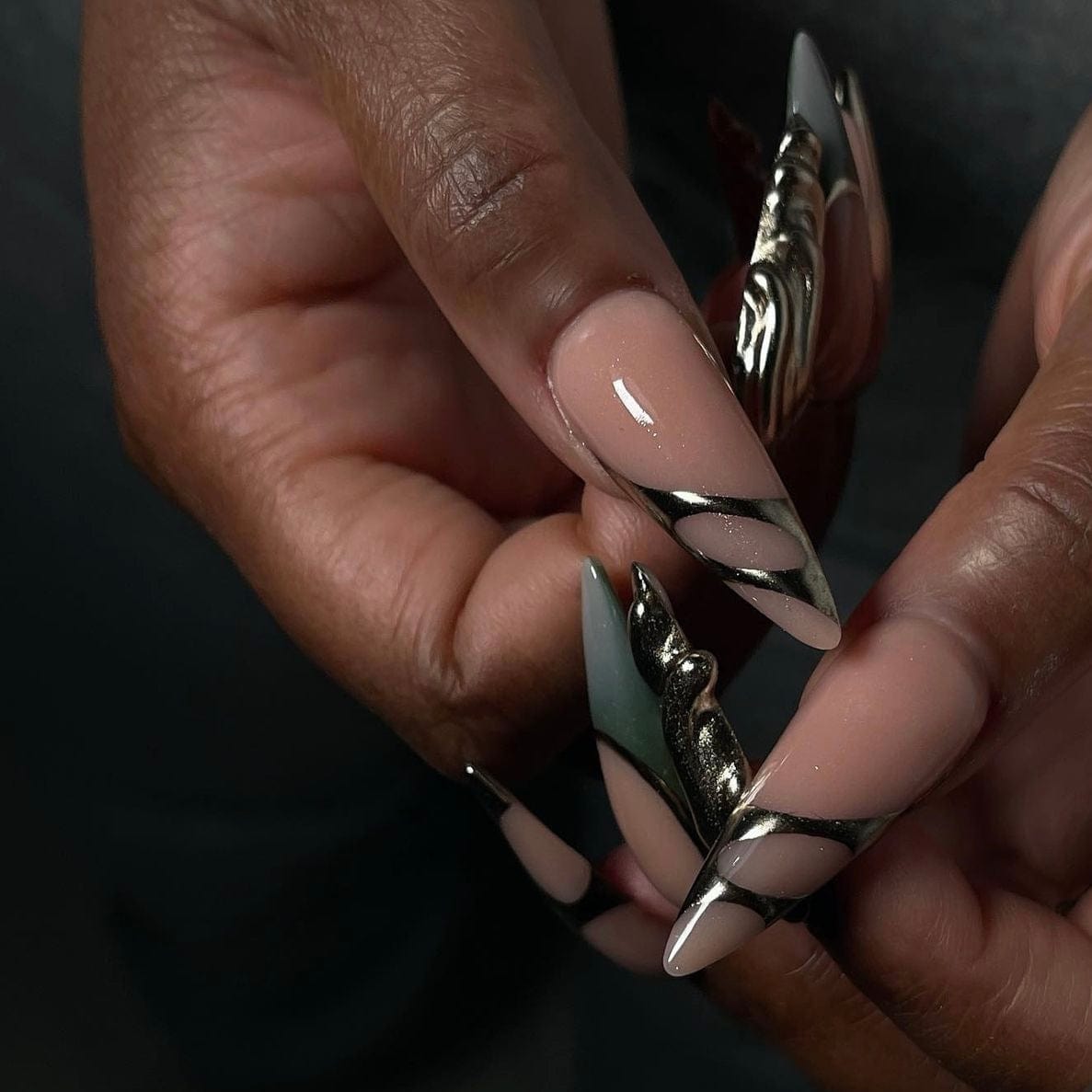 Blue and silver nail designs with an elegant ombre effect transitioning from rich blue to shimmering silver for a sophisticated look.