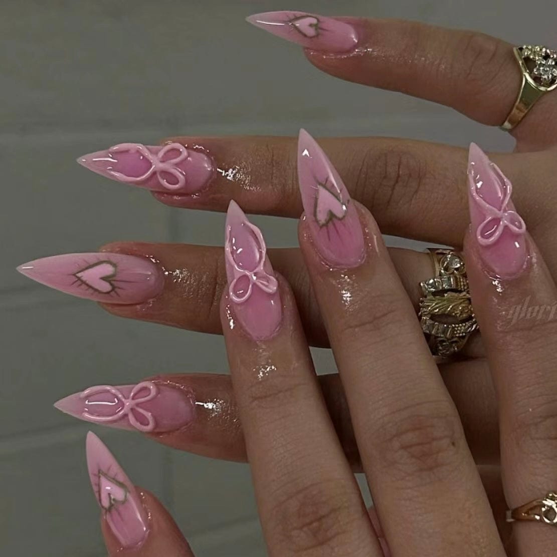 Step into elegance with our captivating bow design nails. Each nail is meticulously crafted to showcase intricate bow motifs, adding a touch of whimsical charm to your manicure.