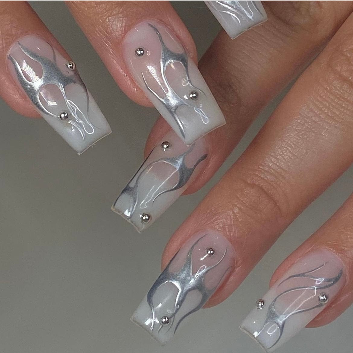 Chrome Design on Milky White Nails