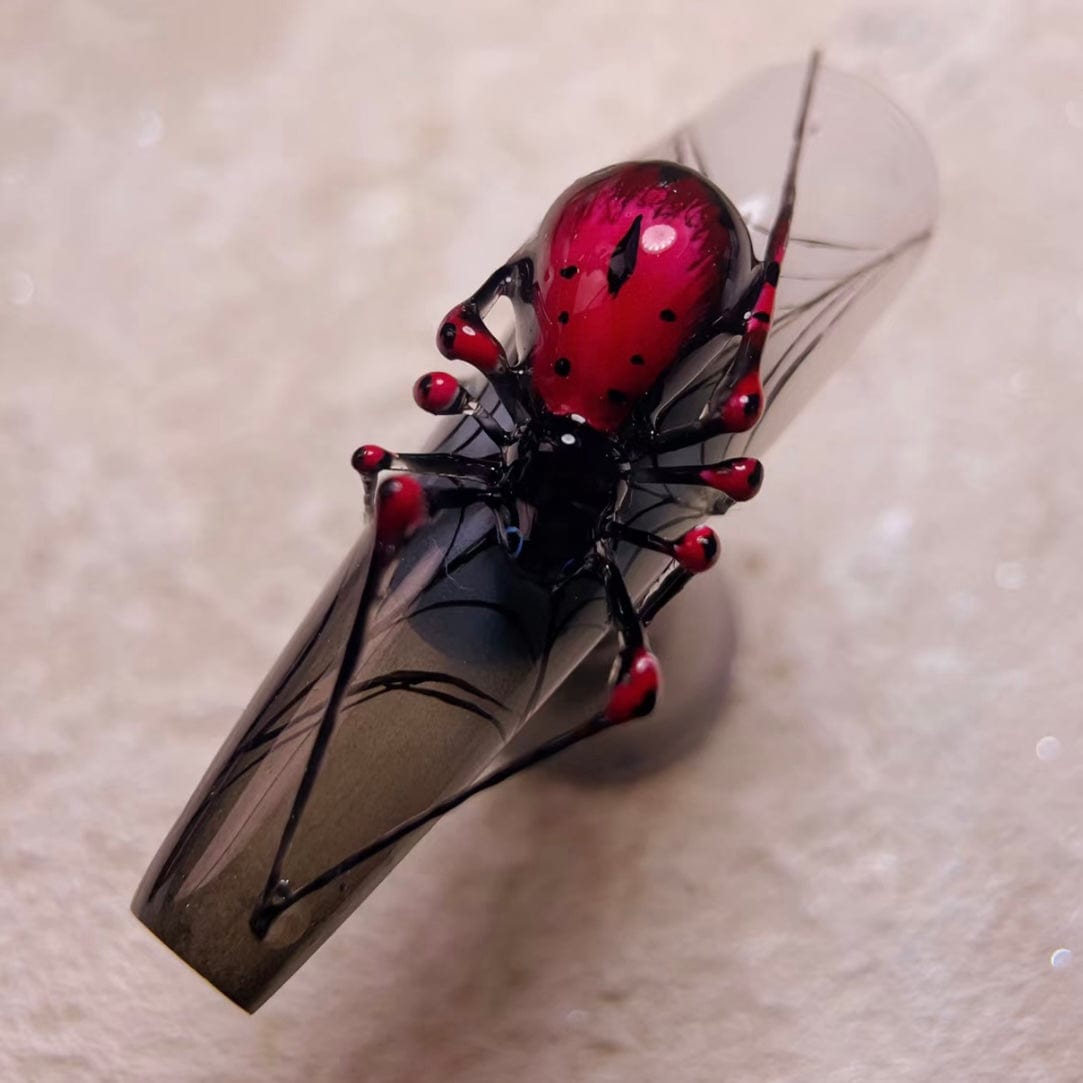 Halloween black nails featuring spider web designs and simple Halloween nails for a stylish and spooky manicure."