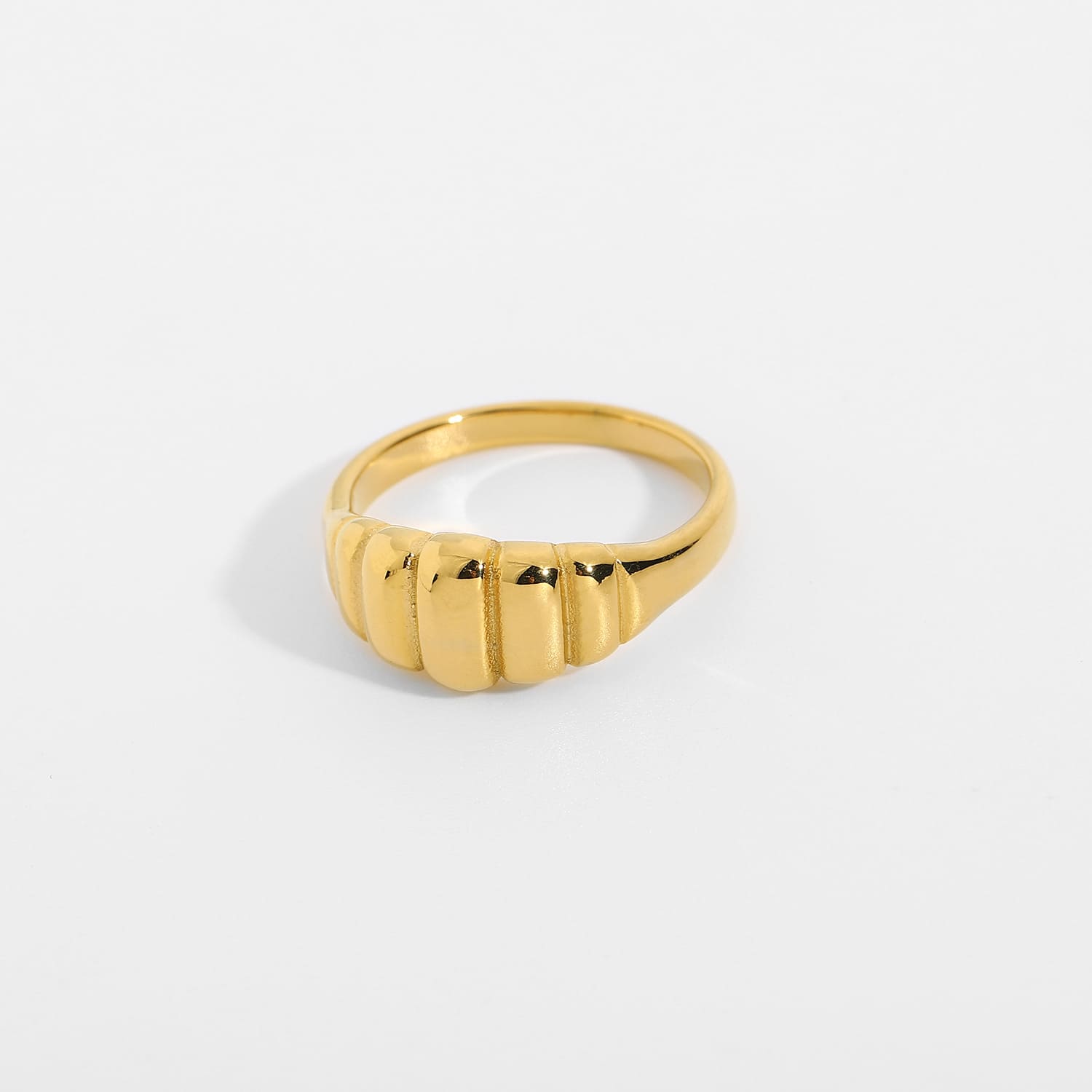 Bold and stylish gold ring on hand, perfect for statement jewelry